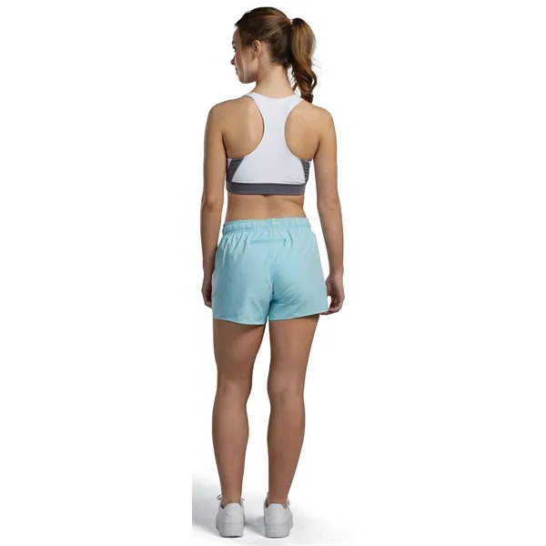Sports bra with racerback styling and contrasting moisture-wicking pinhole mesh back... from ASI 37461 Augusta Sportswear