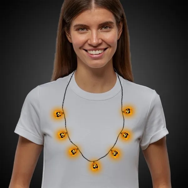 34" Jack-O-Lantern Halloween necklaces with seven light up LED charms.... from ASI 42016 Brighter Promotions Inc