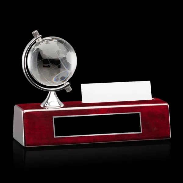 Optical deep etched spinning globe on a high polished rosewood base... from ASI 84592 St Regis Group / St Regis