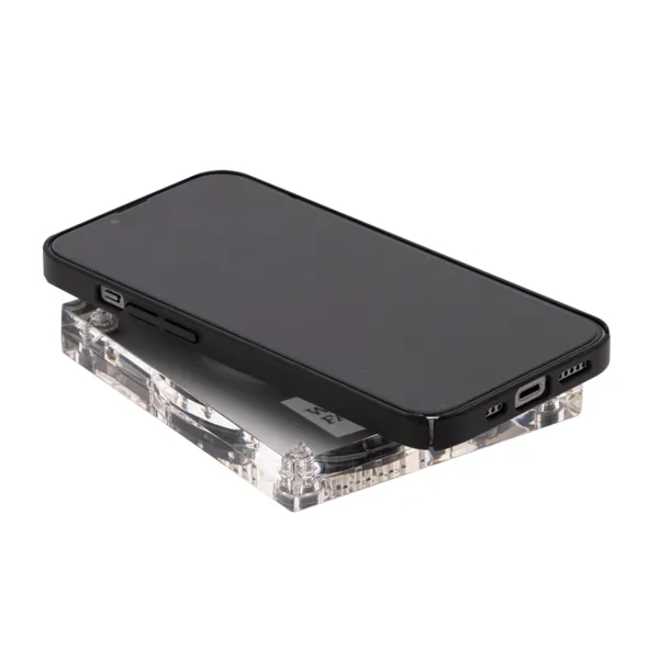 Introducing the Clear Wireless Charger: a sleek and modern solution for... from ASI 88060 Snugz/USA Inc