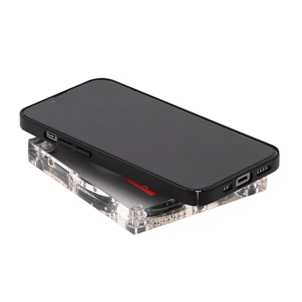 Introducing the Clear Wireless Charger: a sleek and modern solution for... from ASI 88060 Snugz/USA Inc