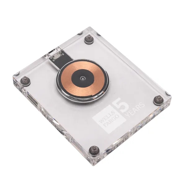 Introducing the Clear Wireless Charger: a sleek and modern solution for... from ASI 88060 Snugz/USA Inc