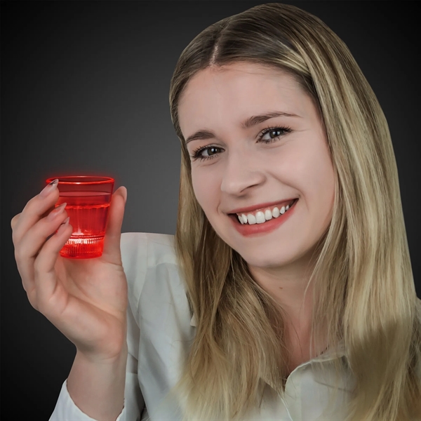 2 ounce acrylic plastic LED light up shot glasses with three... from ASI 42016 Brighter Promotions Inc