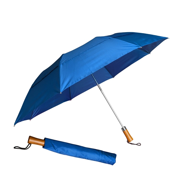 The Icon umbrella; vented and folding masterpiece is designed to keep... from ASI 76730 Peerless Umbrella Co Inc / Threads By Peerless