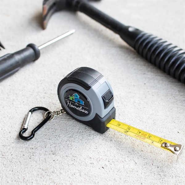 This tape measure is small in size, but certainly measures up!... from ASI 61966 HPG / Beacon Promotions