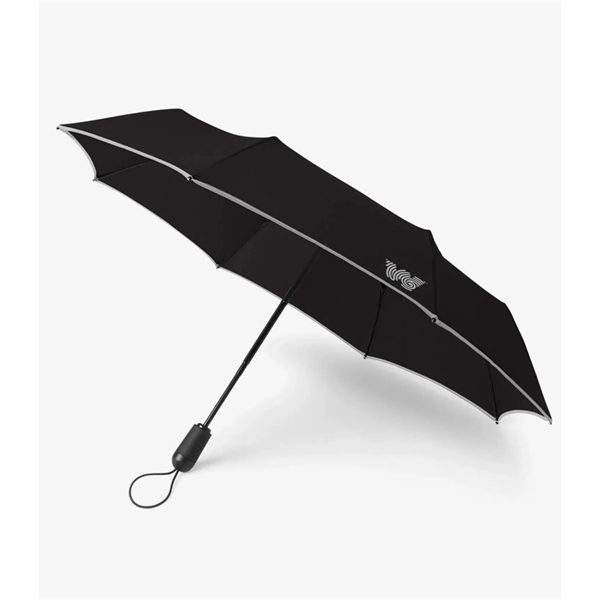 Compact umbrella features auto-open, auto-close device and quick-folding system that casts... from ASI 76730 Peerless Umbrella Co Inc / Threads By Peerless