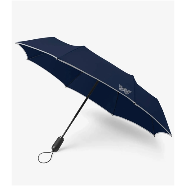 Compact umbrella features auto-open, auto-close device and quick-folding system that casts... from ASI 76730 Peerless Umbrella Co Inc / Threads By Peerless