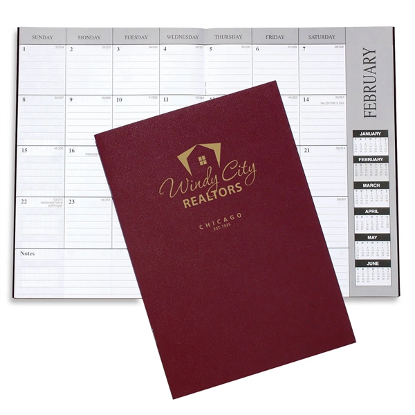 Customizable 10"H x 7"W leatherette 13-month desk planner with 6-month layout.... from ASI 54040 Fey Promo / Fey Calendar Impressions