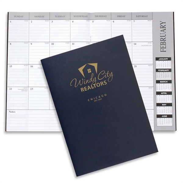 Customizable 10"H x 7"W leatherette 13-month desk planner with 6-month layout.... from ASI 54040 Fey Promo / Fey Calendar Impressions