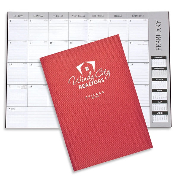 Customizable 10"H x 7"W leatherette 13-month desk planner with 6-month layout.... from ASI 54040 Fey Promo / Fey Calendar Impressions