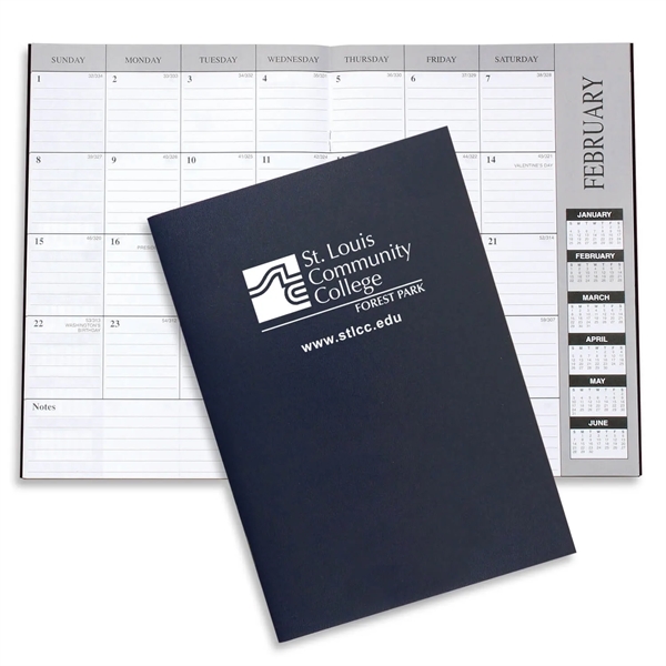 10"H x 7"W leatherette 13-month desk planner with 6-month layout.... from ASI 54040 Fey Promo / Fey Calendar Impressions