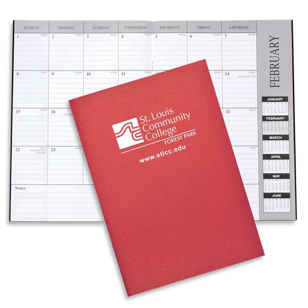 10"H x 7"W leatherette 13-month desk planner with 6-month layout.... from ASI 54040 Fey Promo / Fey Calendar Impressions