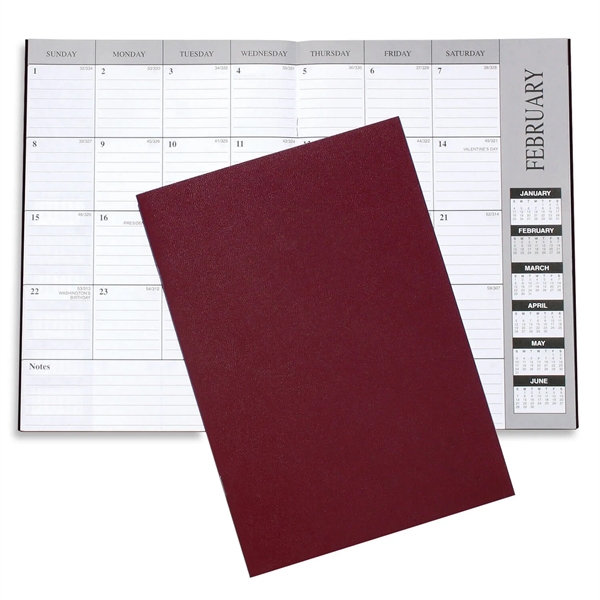 10"H x 7"W leatherette 13-month desk planner with 6-month layout.... from ASI 54040 Fey Promo / Fey Calendar Impressions