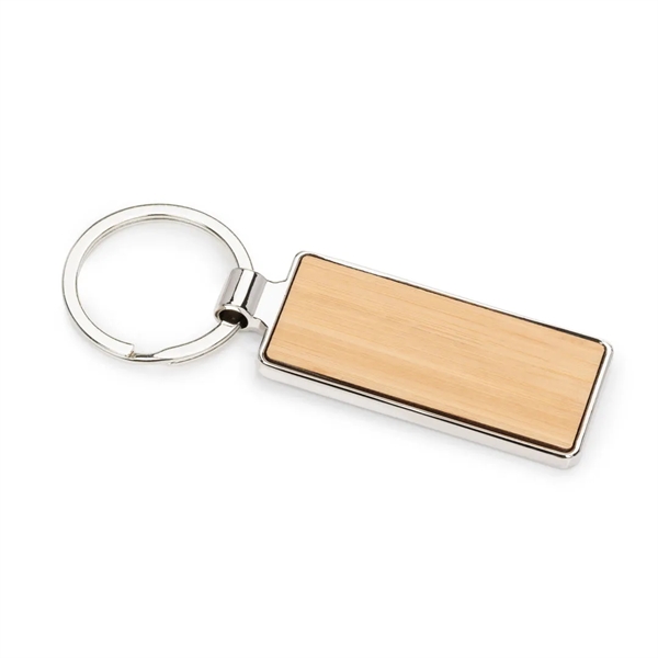 The Kerins Rectangle Keychain is a polished chrome accessory with bamboo... from ASI 84592 St Regis Group