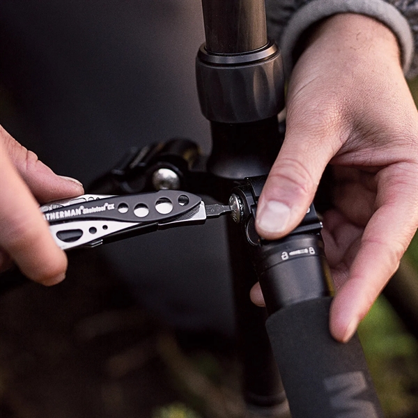 Lightweight multi-tool with tungsten DLC coating, pliers, wire cutters, blade, carabiner... from ASI 46170 Compass Industries Inc