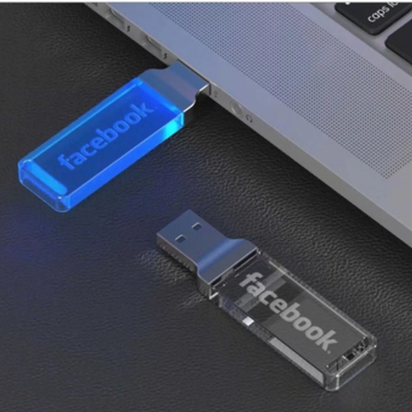 Light up clear acrylic USB flash drive plus laser engraved on... from ASI 37218 Athena Promo (tm)