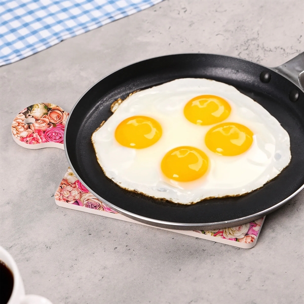 The Compliments Ceramic Trivet offers a stylish and effective heat-resistant surface... from ASI 61966 HPG / Beacon Promotions