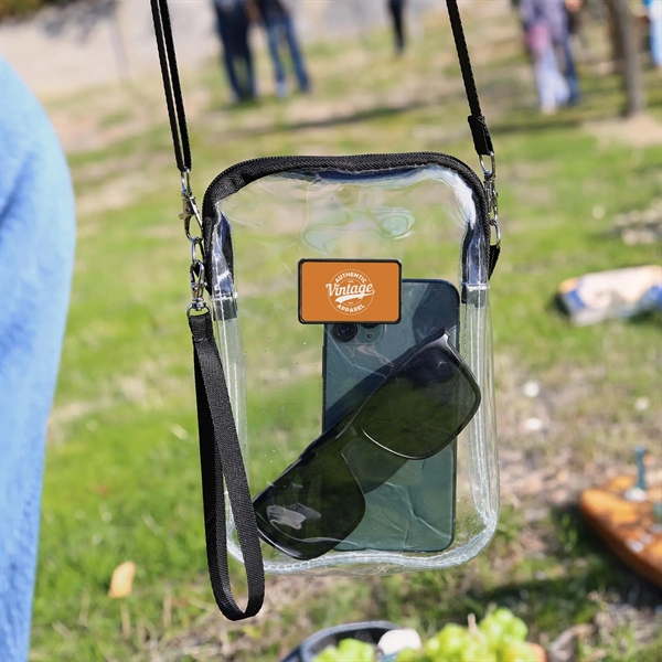 A stadium-approved clear crossbody clutch with a removable adjustable crossbody strap... from ASI 61966 HPG / Best Promotions USA