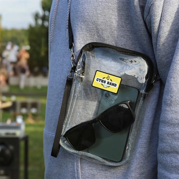 A stadium-approved clear crossbody clutch with a removable adjustable crossbody strap... from ASI 61966 HPG / Best Promotions USA