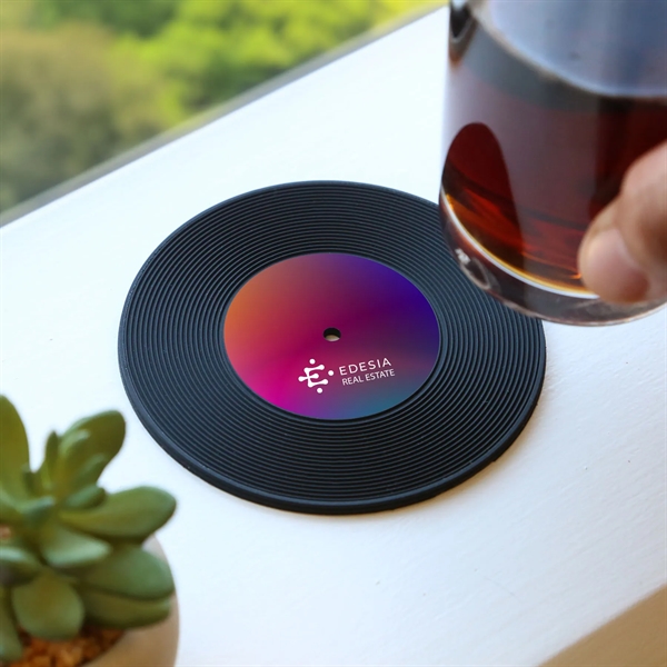 The Vintage Record Coaster combines nostalgic design with durable functionality, resonating... from ASI 61966 HPG / Beacon Promotions