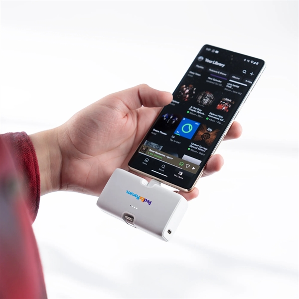 A dual flip power bank that plugs into the bottom of... from ASI 91435 Tomax USA / Tomax