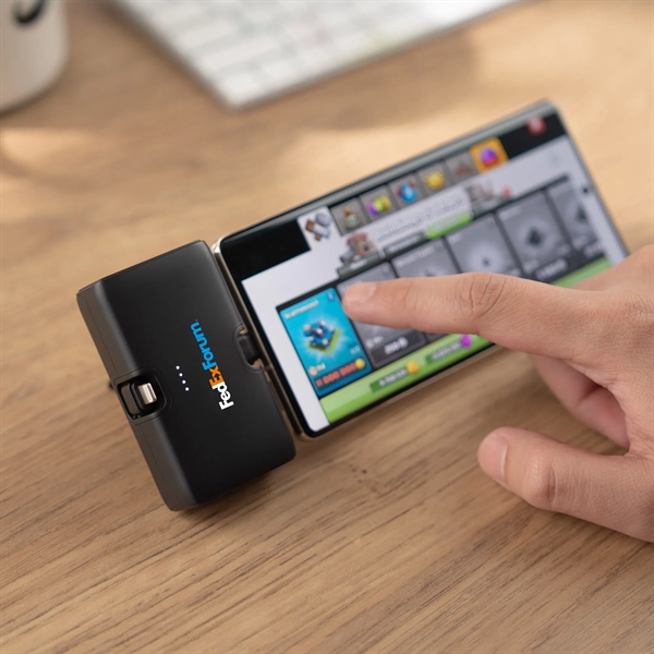 A dual flip power bank that plugs into the bottom of... from ASI 91435 Tomax USA / Tomax