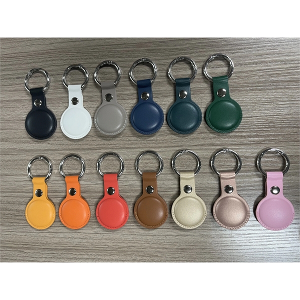 AirTag holder connected to a keyring, made out of vegan leather.... from ASI 30250 AZX Sport USA