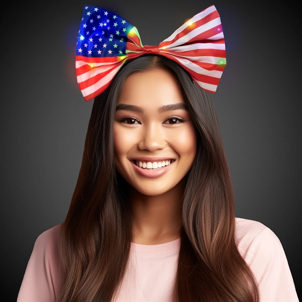 USA flag themed, light up headband/bow with flashing red and blue... from ASI 42016 Brighter Promotions Inc