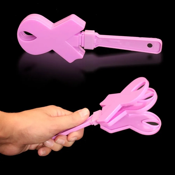 6 3/4" pink ribbon shaped hand clapper.... from ASI 42016 Brighter Promotions Inc / Chemical Light™