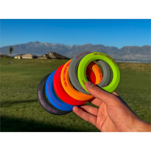Silicone wristband/flying disc.... from ASI 88060 Snugz/USA Inc