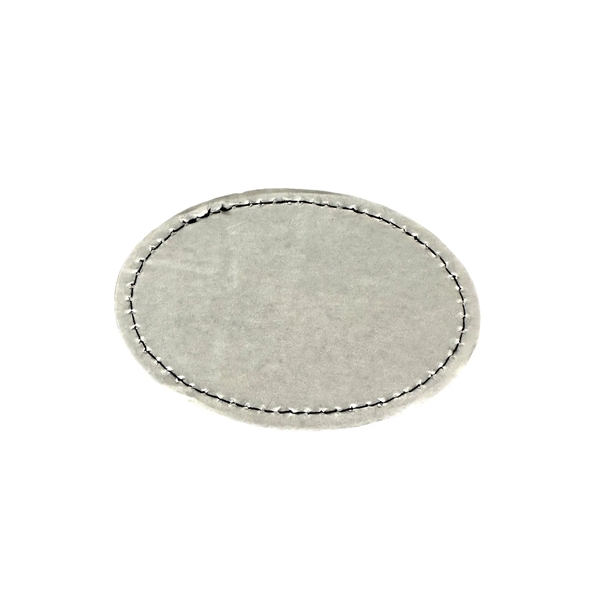 Oval shaped leatherette patch with debossed imprint and standard shipping to... from ASI 37218 Athena Promo (tm)