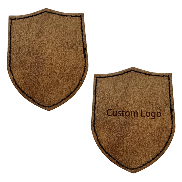 Shield shaped leatherette patch with debossed imprint and standard shipping to... from ASI 37218 Athena Promo (tm)