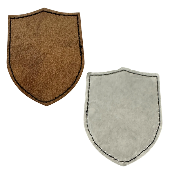 Shield shaped leatherette patch with debossed imprint and standard shipping to... from ASI 37218 Athena Promo (tm)