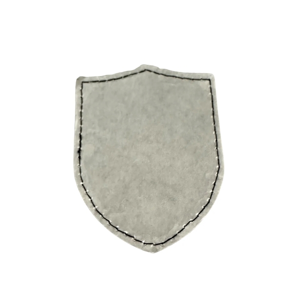Shield shaped leatherette patch with debossed imprint and standard shipping to... from ASI 37218 Athena Promo (tm)