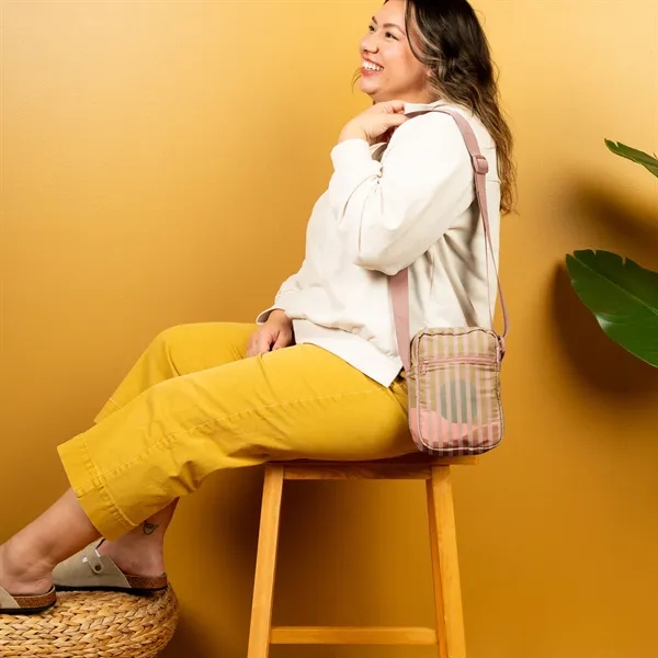 All the greatness of the Landscape Crossbody, streamlined into a vertical... from ASI 74710 Numo