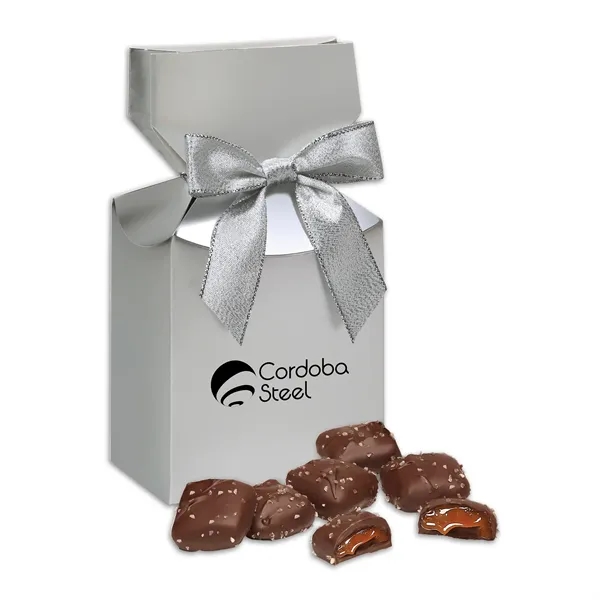 Metallic silver gift box filled with chocolate sea salt caramels.... from ASI 68680 Maple Ridge Farms Inc