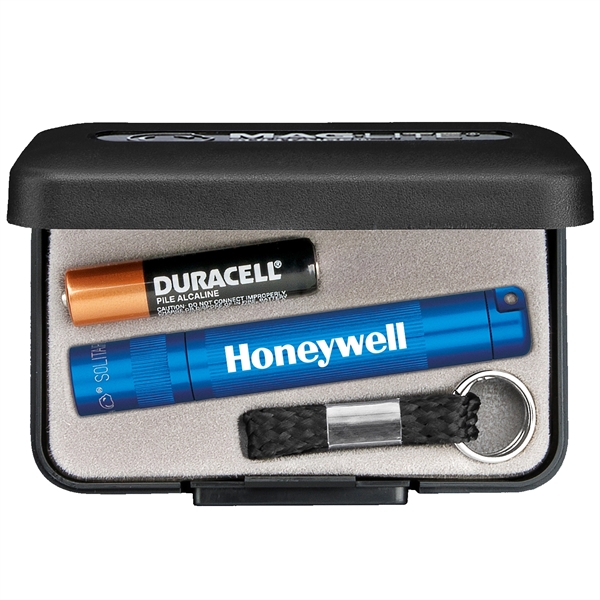 Mag-Lite flashlight with a keyring/lanyard attachment and one "AAA" battery.... from ASI 46170 Compass Industries Inc