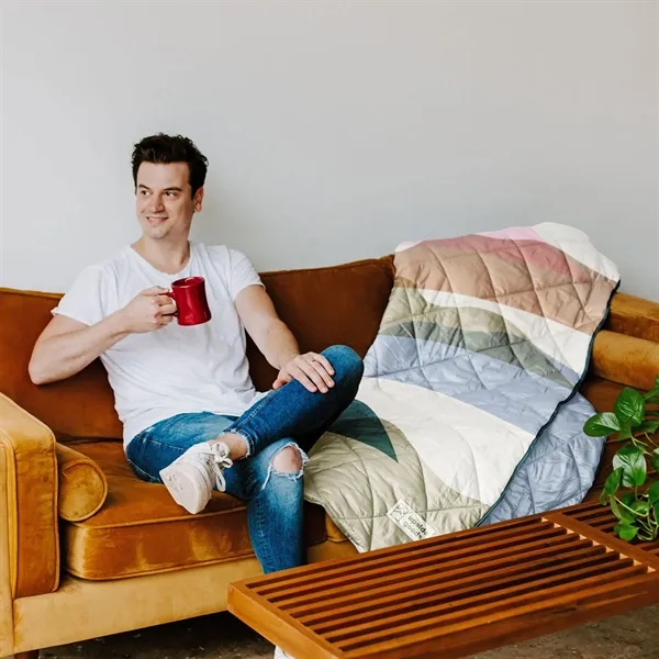 Our puffy quilted blanket works great indoors or out, and it... from ASI 74710 Numo