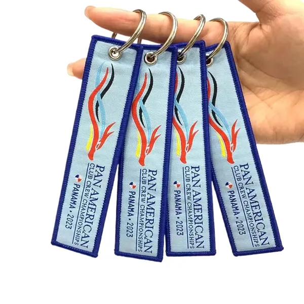 Woven keychain with metal ring plus 1 color woven on both... from ASI 37218 Athena Promo (tm)