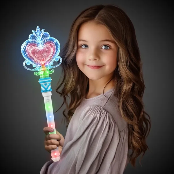 Heart-shaped wand with light-up handle, blue or pink trim and 3... from ASI 42016 Brighter Promotions Inc