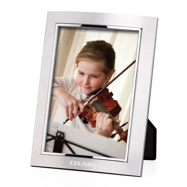 The City Lights frame series feature a curved metal surface of... from ASI 84592 St Regis Group