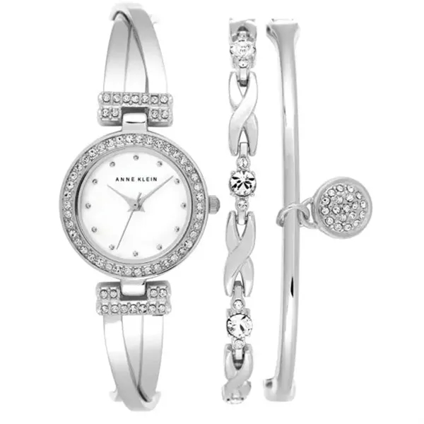A beautiful bangle watch with a crystal accented charm & 1... from ASI 61966 HPG / HPG Gold Beacon Premium Brands