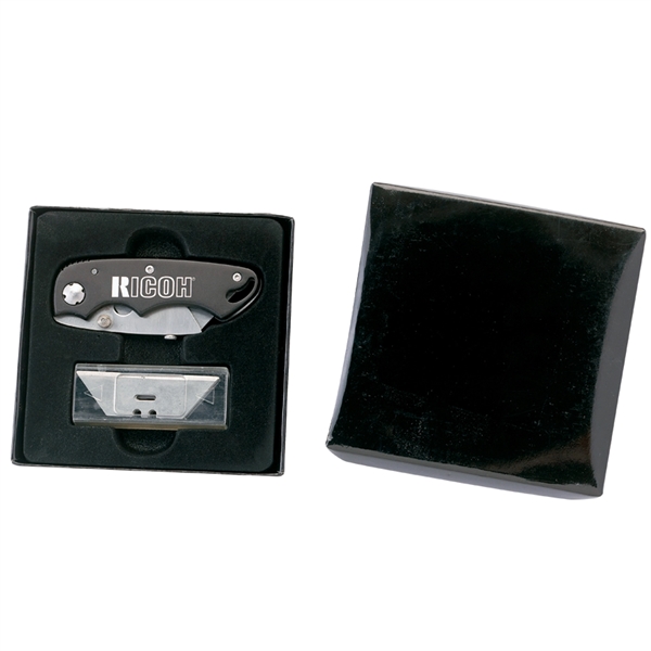 Folding utility knife with anodized aluminum handle in stainless steel construction... from ASI 46170 Compass Industries Inc