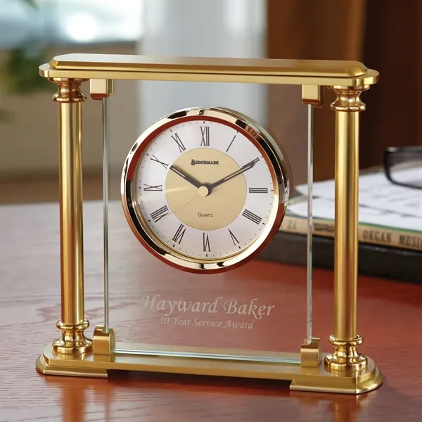 Desk clock with brass-colored case with satin finished columns suspended in... from ASI 68507 The Magnet Group / Benchmark Crystal & Clocks