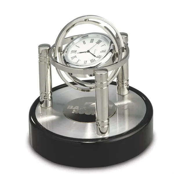 Quartz clock designed with gimbaled movement with silver posts, black piano... from ASI 68507 The Magnet Group / Benchmark Crystal & Clocks