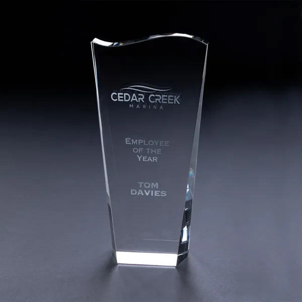 7 3/4" tall optical crystal award with wave design on the... from ASI 68507 The Magnet Group / Benchmark Crystal & Clocks