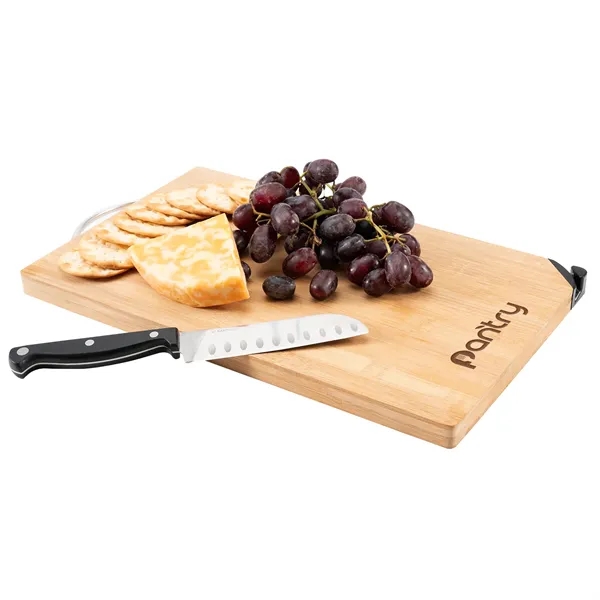 This large bamboo cutting board comes with a metal handle and... from ASI 68507 The Magnet Group / Innovations by Magnet™