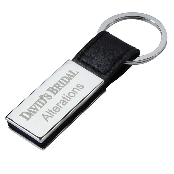 Strap key tag with chrome-plated finish and black accent.... from ASI 68507 The Magnet Group / Innovations by Magnet™