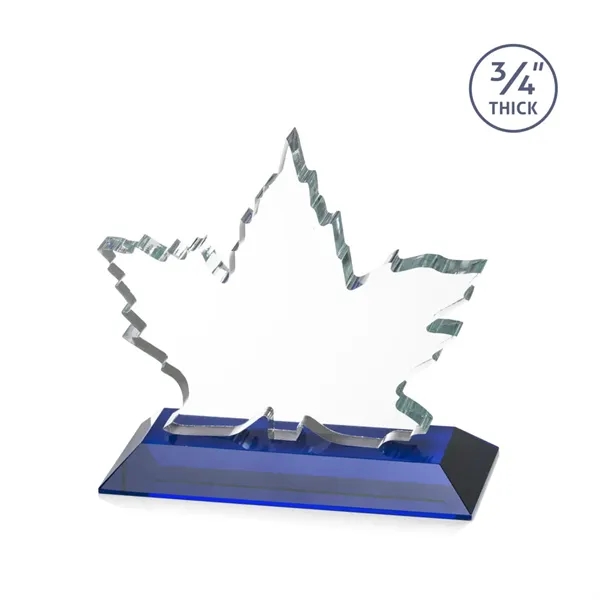 Stunning Starfire Crystal formed into a beautiful maple leaf mounted on... from ASI 84592 St Regis Group / St Regis