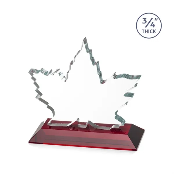 Stunning Starfire Crystal formed into a beautiful maple leaf mounted on... from ASI 84592 St Regis Group / St Regis